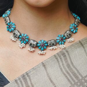 Sky blue stone elephant design oxidised silver chain with matching earrings