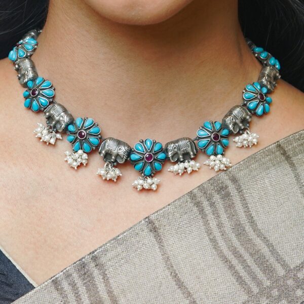 varam_chains_sky_blue_stone_elephant_design_oxidised_silver_chain_with_matching_earrings-1