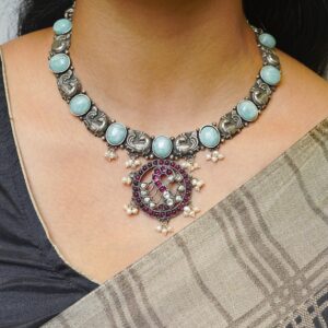 Turquoise blue and pink stone peacock design oxidised silver chain with matching earrings