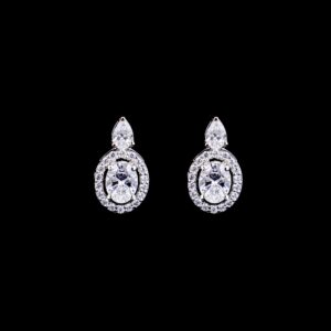 White stone oval design silver earrings