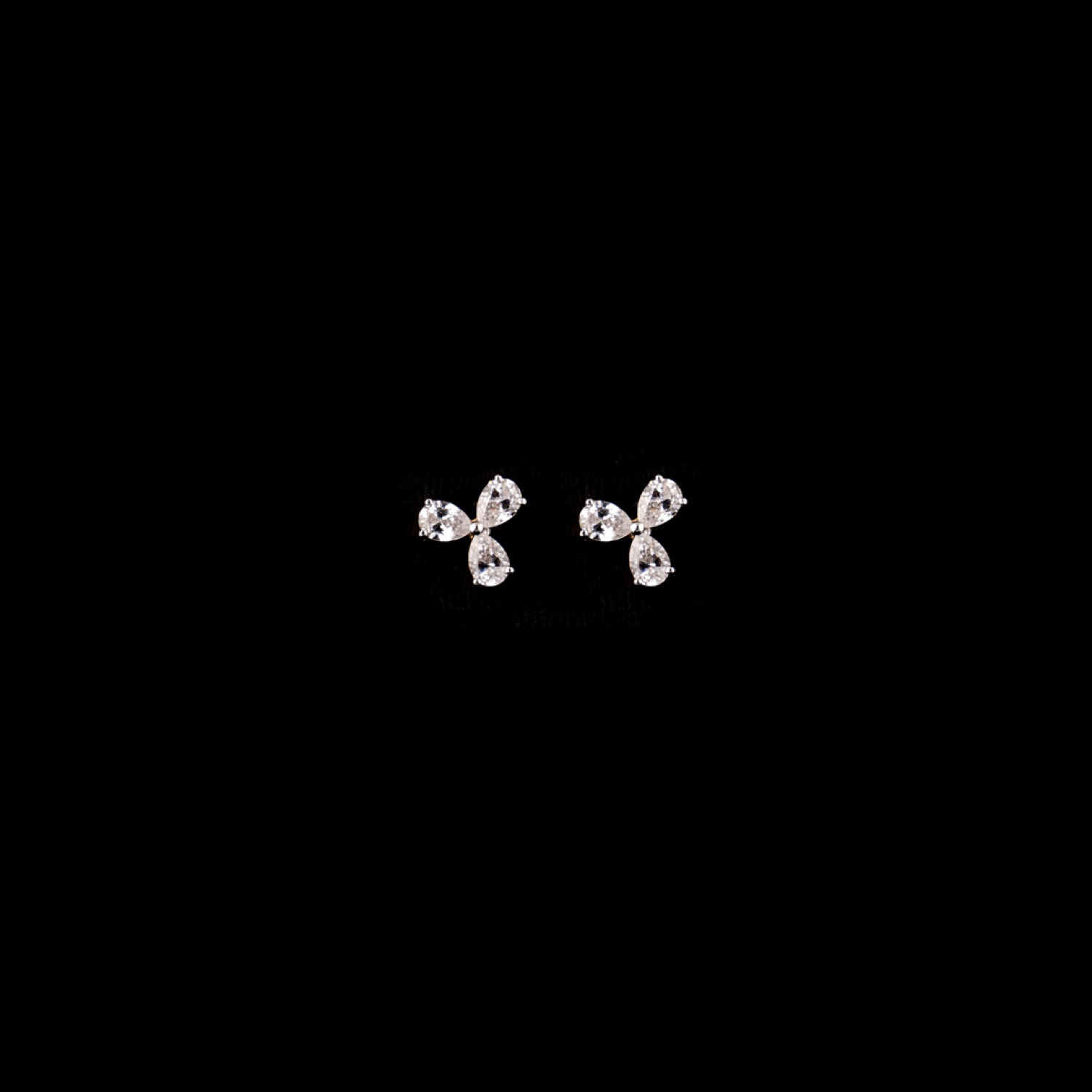 varam_earrings_102022_pear_cut_triple_stone_gold_coated_silver_earrings-1