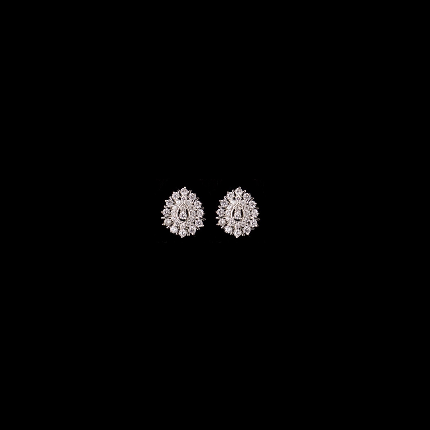 varam_earrings_102022_white_stone_studded_pear_shaped_silver_earrings-1