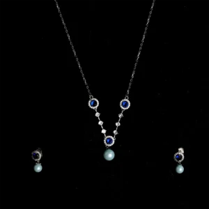 Silver and blue and white stone earrings and same design pendant on chain set