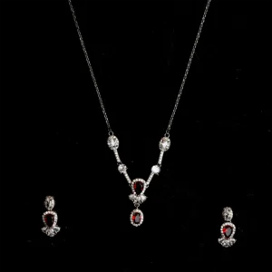 Silver and leaf shaped white and red stones pendant and earrings set