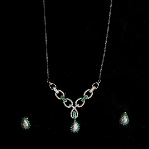 Silver and loop style pendant with green stones and earrings set